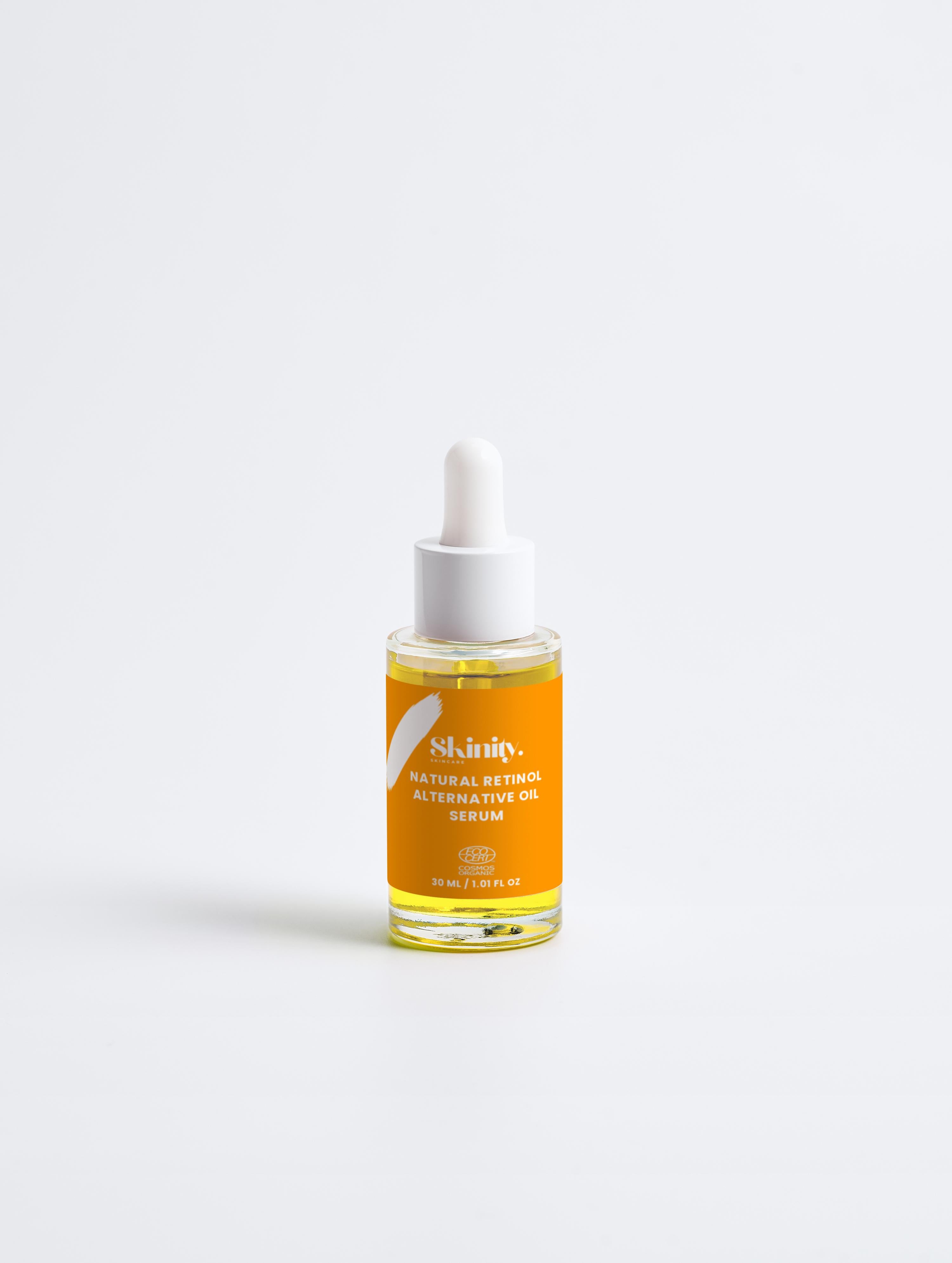 Natural Retinol Alternative Oil Serum in a dropper bottle showcasing its vibrant color and packaging design.