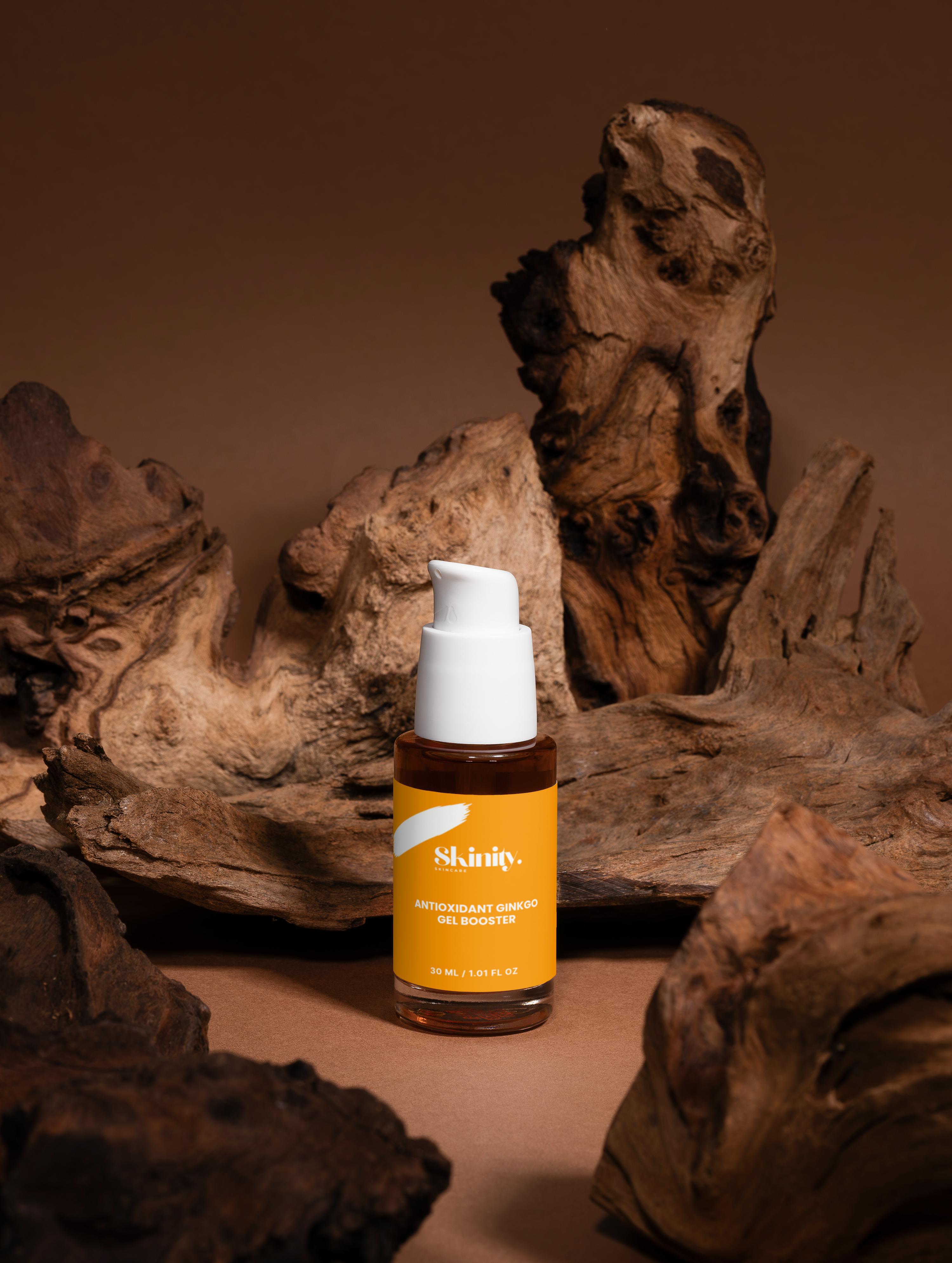 Antioxidant ginkgo gel booster displayed on rustic wooden background, highlighting its eco-friendly packaging.