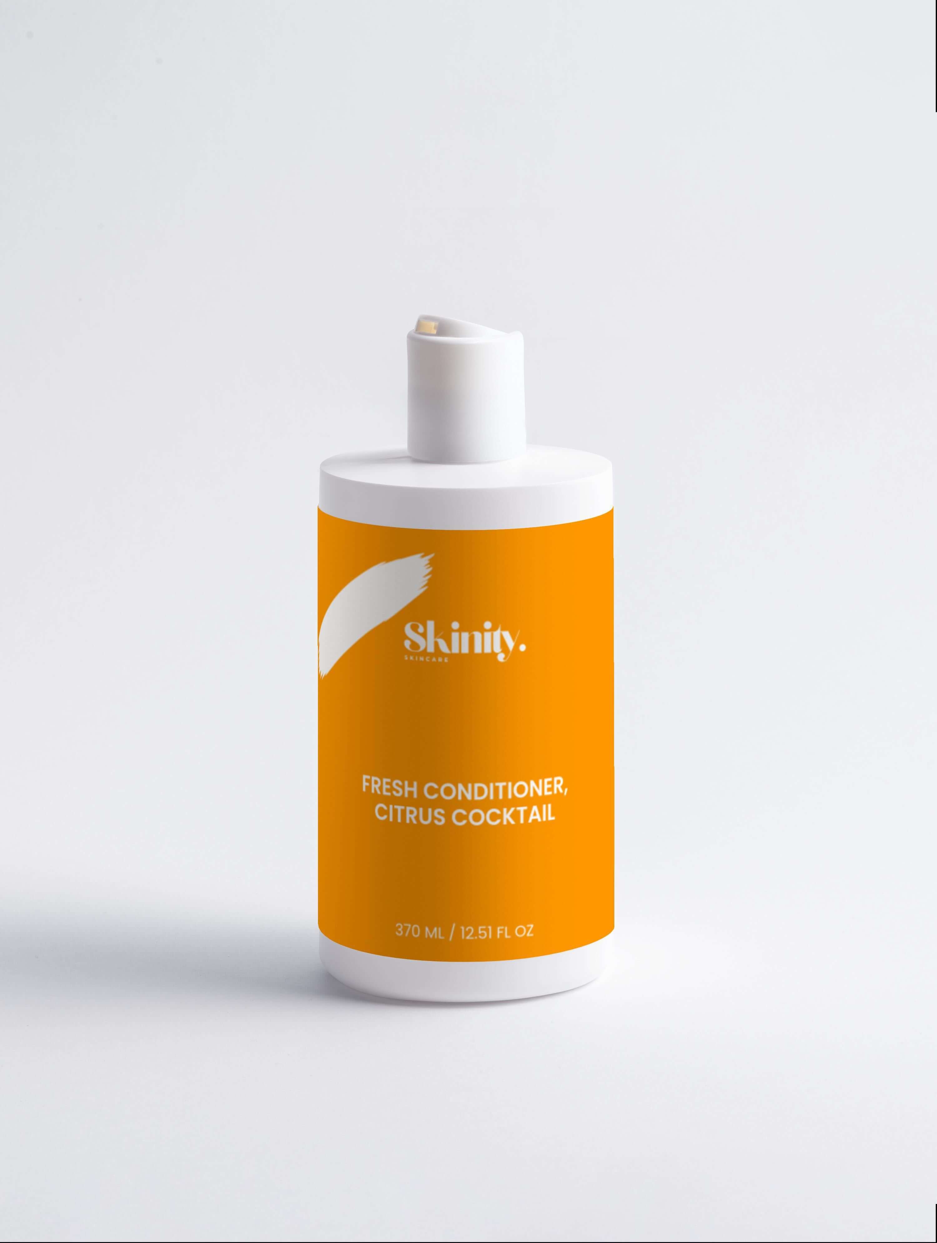 Fresh Conditioner Citrus Cocktail bottle with bright orange label for nourishing hair care.
