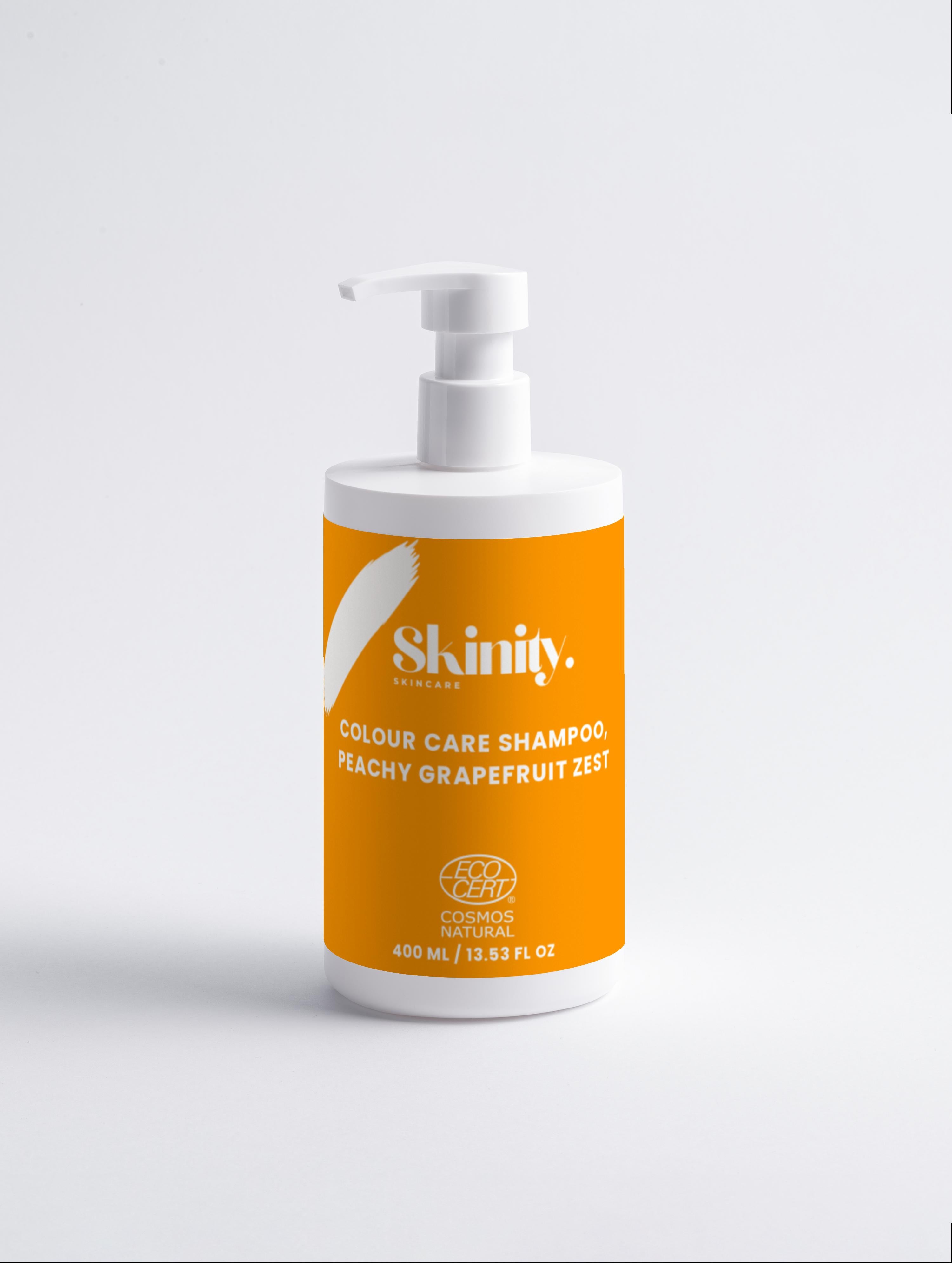 Colour Care Shampoo Peachy Grapefruit Zest in a bottle with pump, designed for vibrant colored hair care.