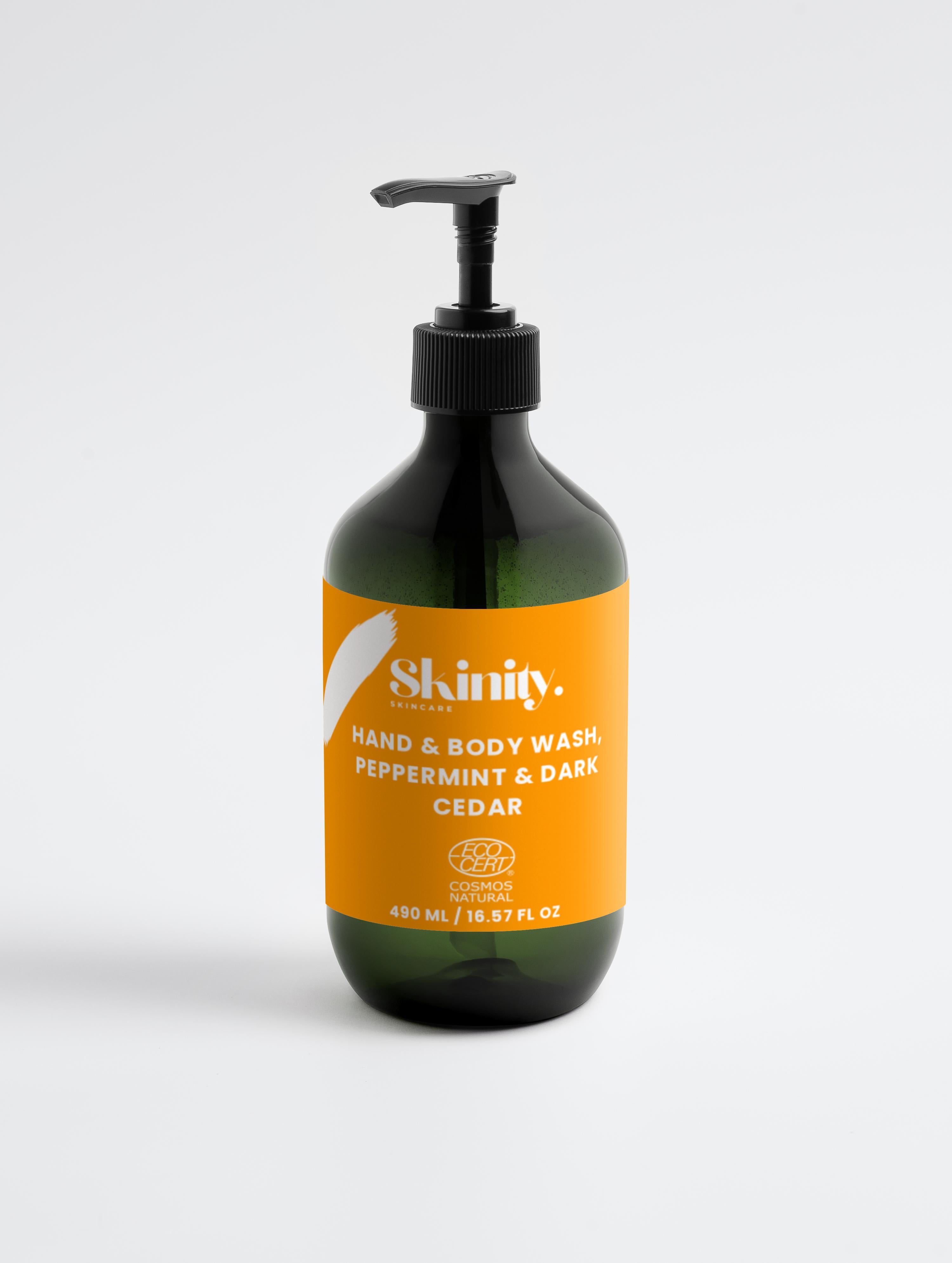 Hand and Body Wash Peppermint and Dark Cedar in a black bottle with a pump dispenser.