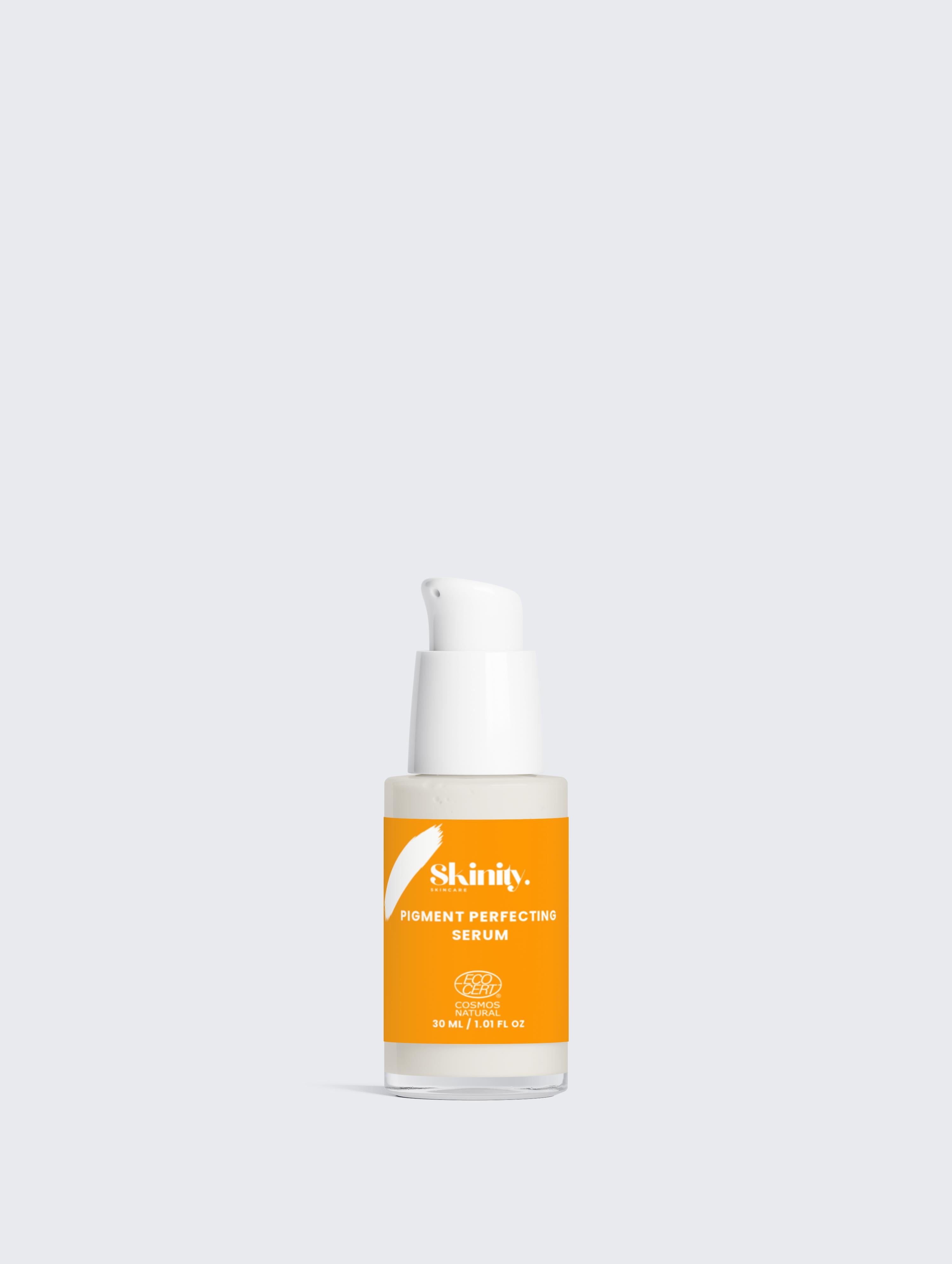 Pigment Perfecting Serum for All Skin in a clear glass bottle with a pump dispenser and orange label.
