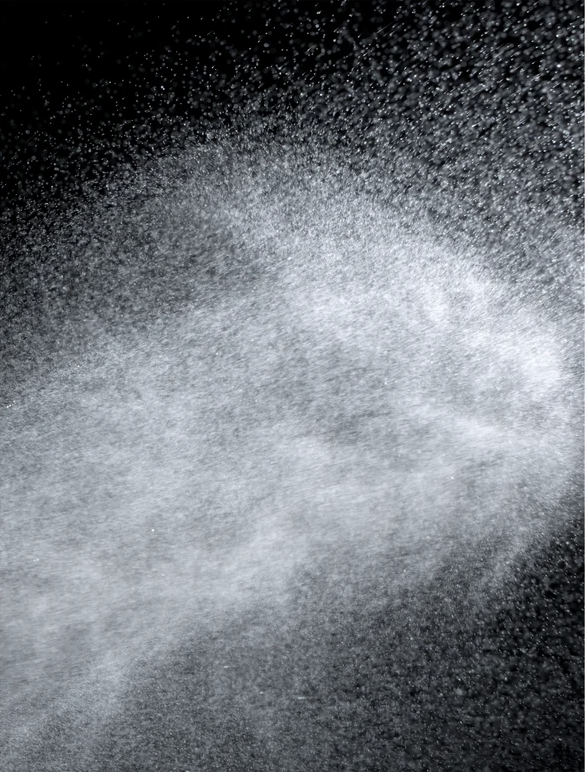 Keratin Shine Leave In Hair Mist spray mist creating a silky, smooth hair treatment with a glossy finish.