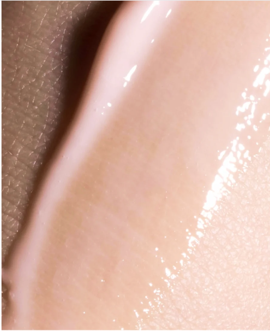Close-up of Peptide Anti-Aging Serum for All skincare, showcasing its smooth texture on skin.