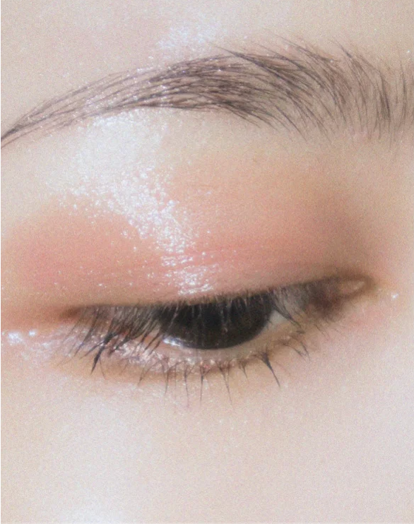 Close-up of an eye showcasing smoothness, illuminated skin, ideal for demonstrating the effects of smoothing eye cream.