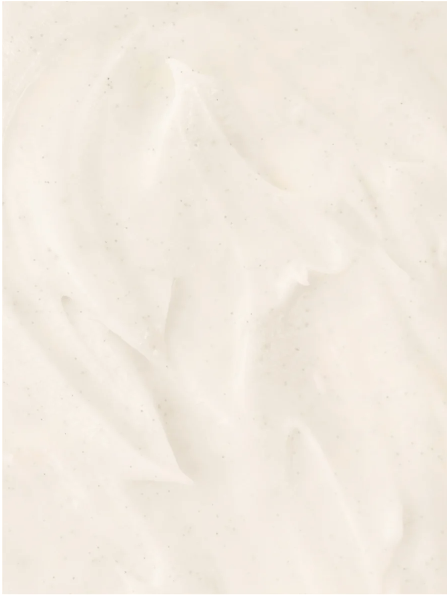 Brightening Face and Body Exfoliator with Kojic Acid creamy texture, ideal for gentle exfoliation and skin brightening.