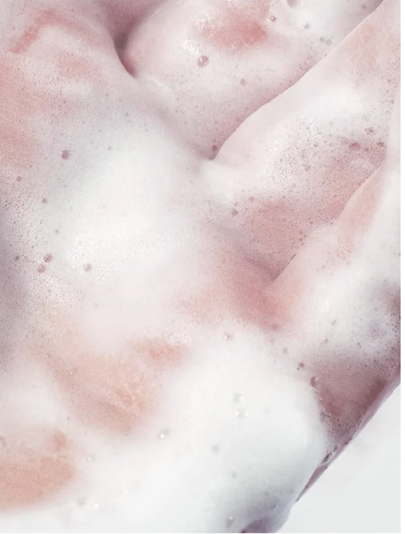Cleansing Foam for all skincare bubbles on skin, showcasing gentle cleansing properties and fresh feel.