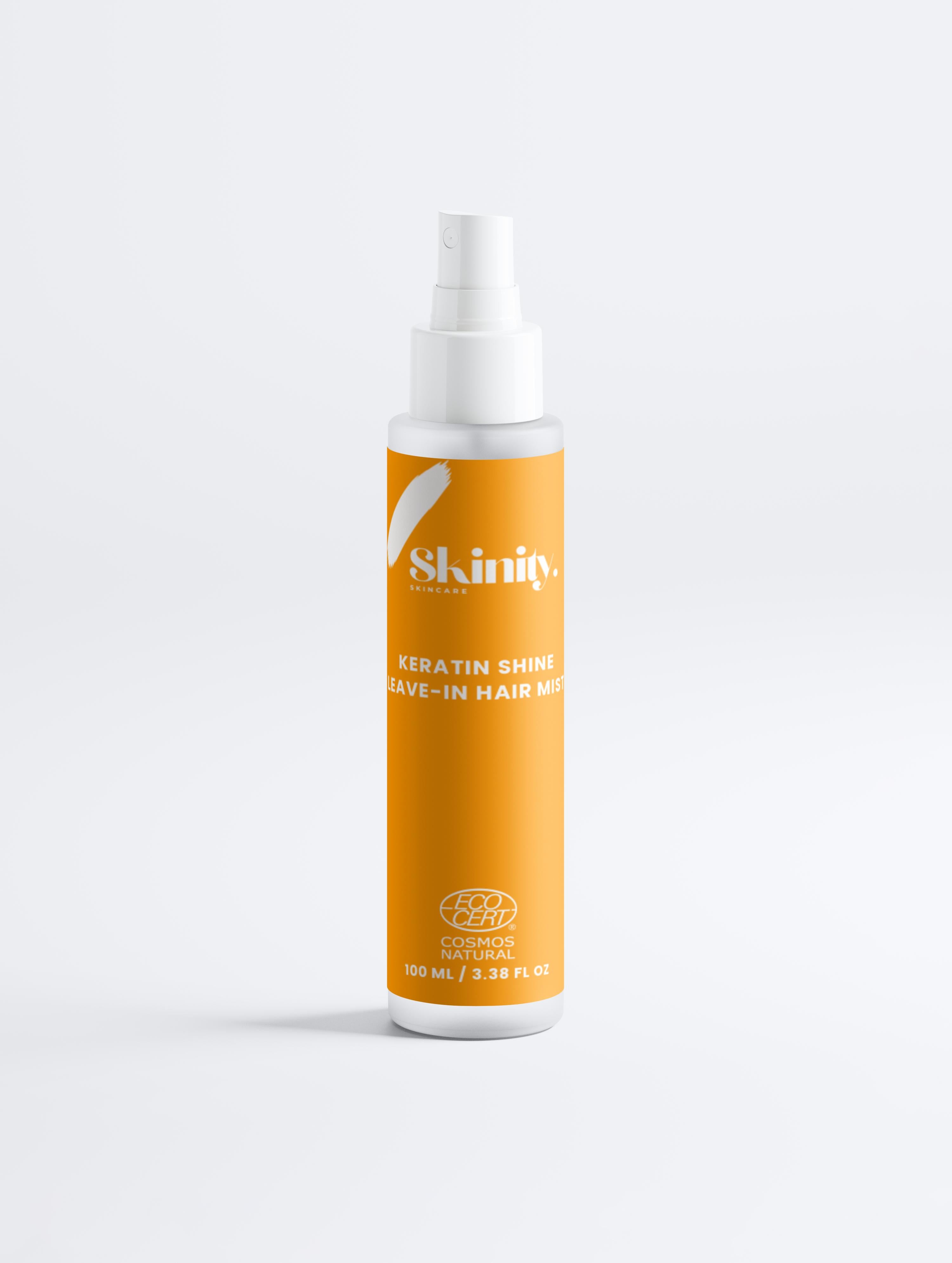 Keratin Shine Leave In Hair Mist bottle with yellow label, delivering smoothness and shine for damaged hair.