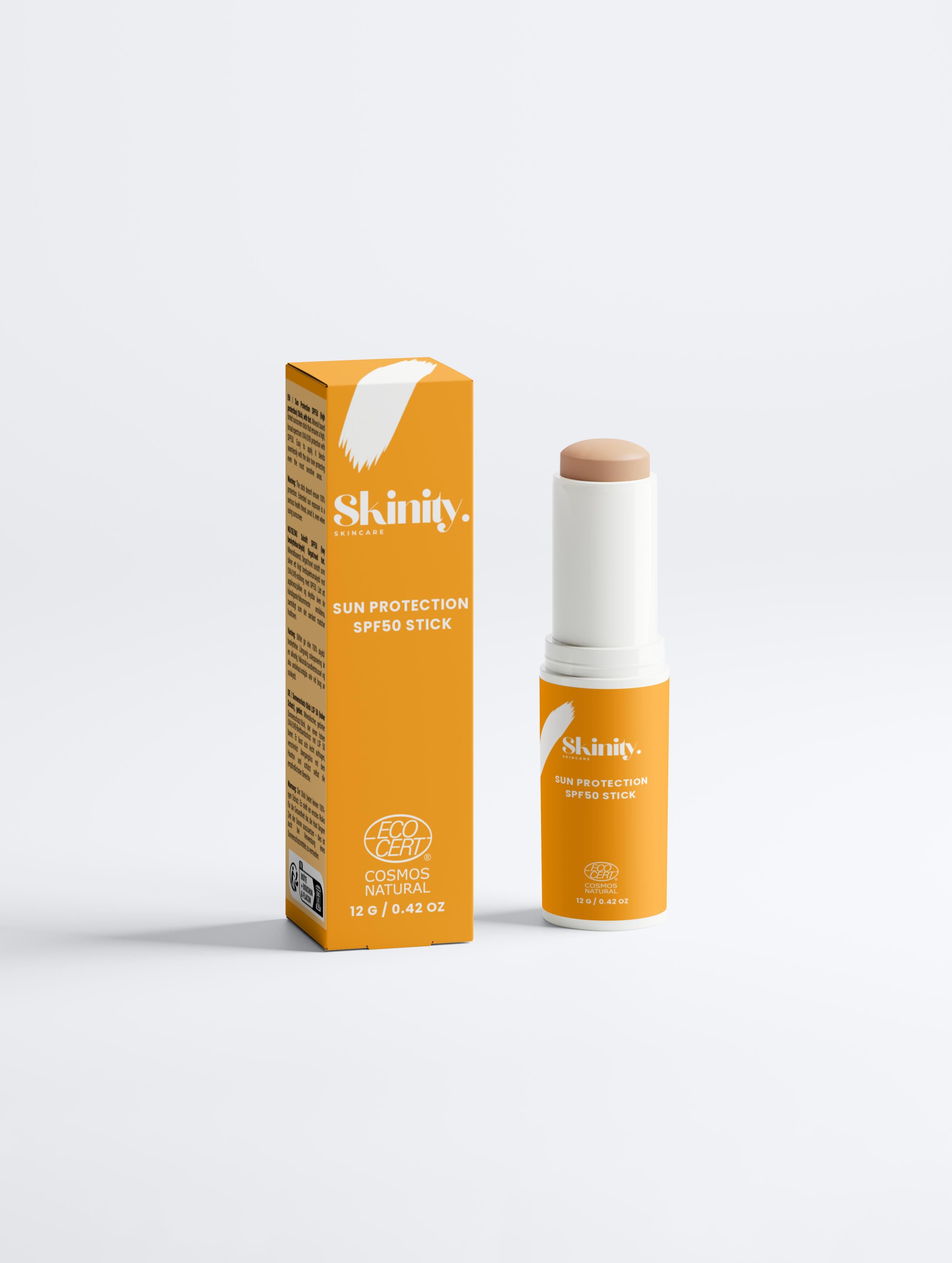 SPF 50 tinted sunscreen stick with packaging, providing broad-spectrum sun protection for all skin types.
