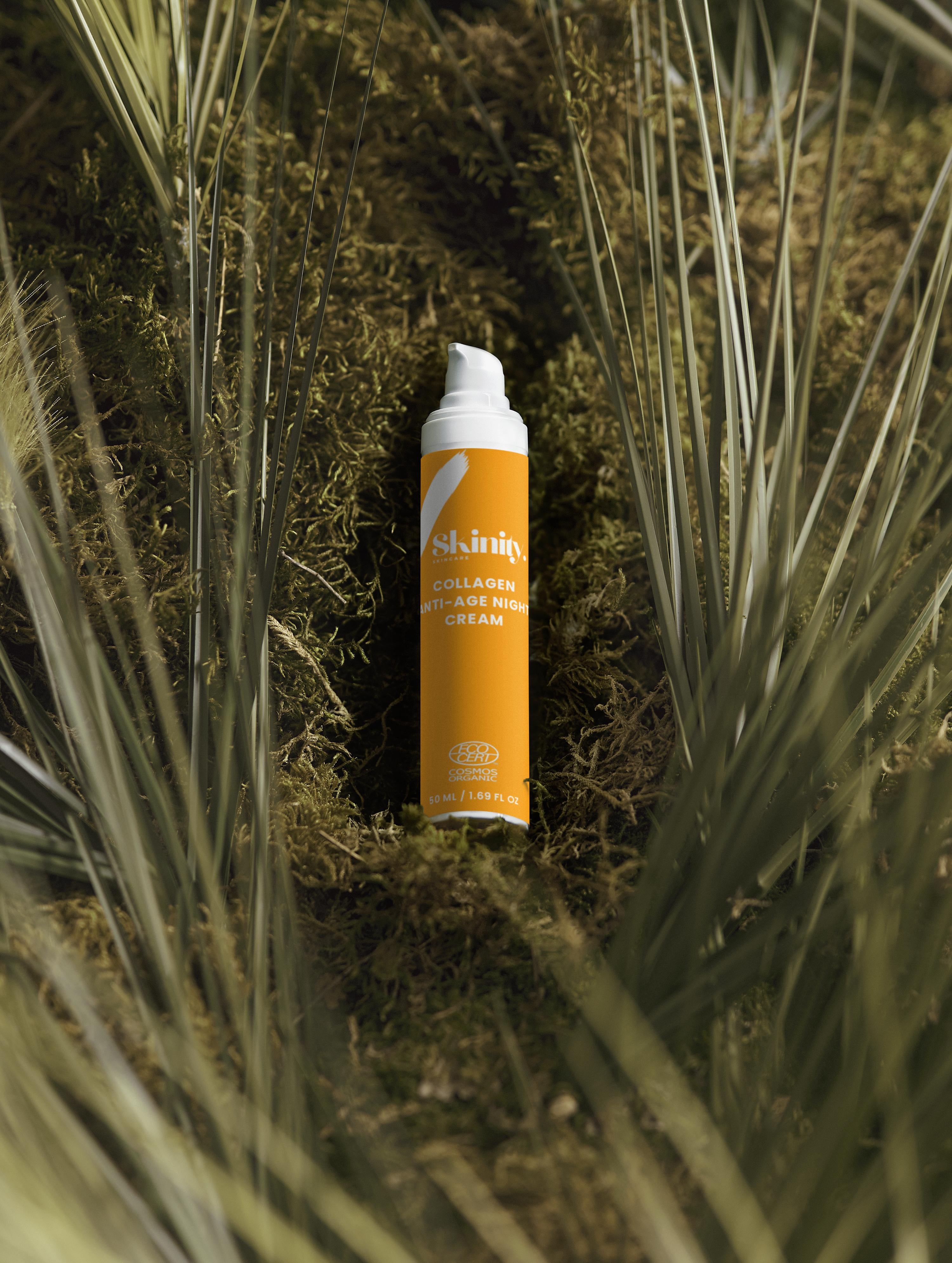 Collagen Anti-Age Night Cream for all Skin Types on moss with palm leaves background