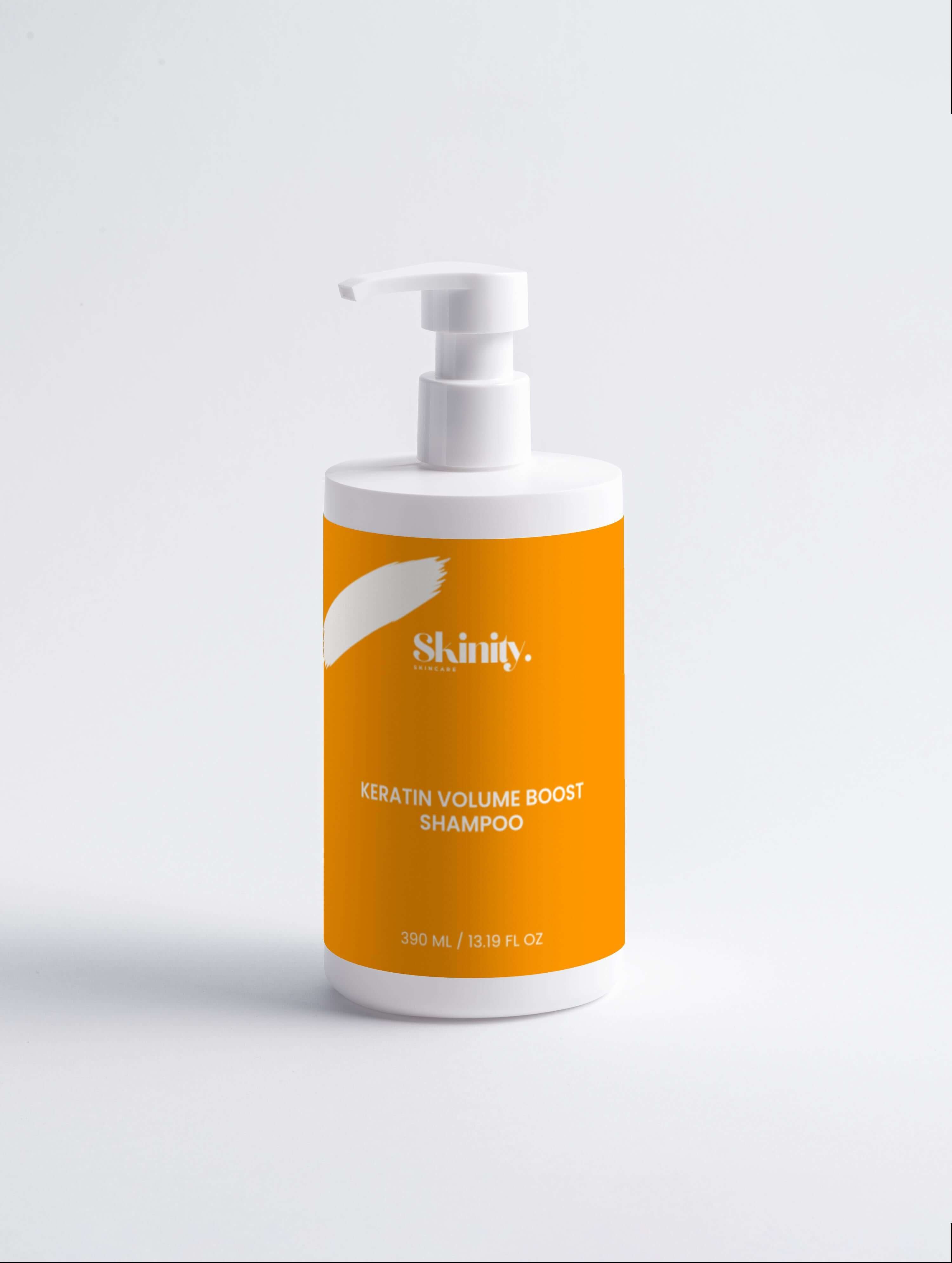 Keratin volume boost shampoo for all hair types in a white pump bottle with an orange label, 350ml.